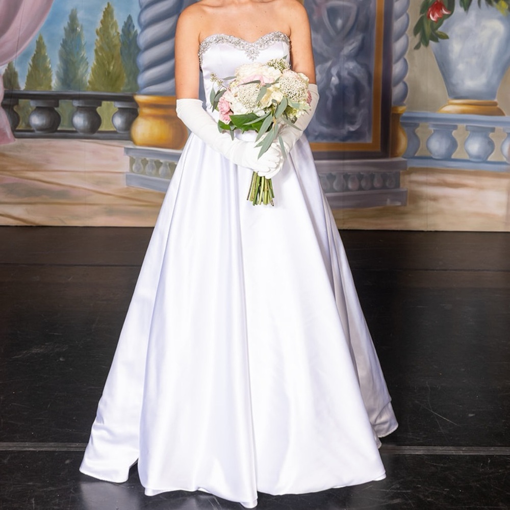 Elegant White Strapless Gown by Justin Alexander